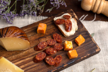 table of cold meats sausages salamin red chorizo sopresatta longaniza and various cheeses with...