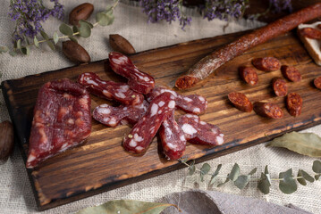 table of cold meats sausages salamin red chorizo sopresatta longaniza and various cheeses with...