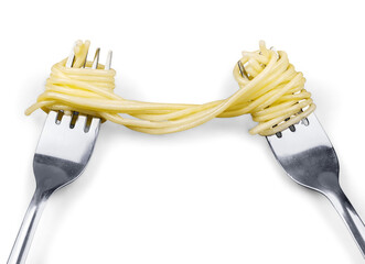 Forks with boiled spaghetti on white background