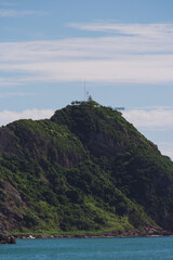 lighthouse view of the sea and mountains