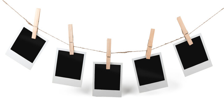 Five Blank Polaroid Frames Hanging on Twine Attached with Clothespins - Isolated
