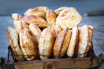 A street vendor's Kaak cart contain fresh  snack in Tripoli Souks. Usually most of these vendors...