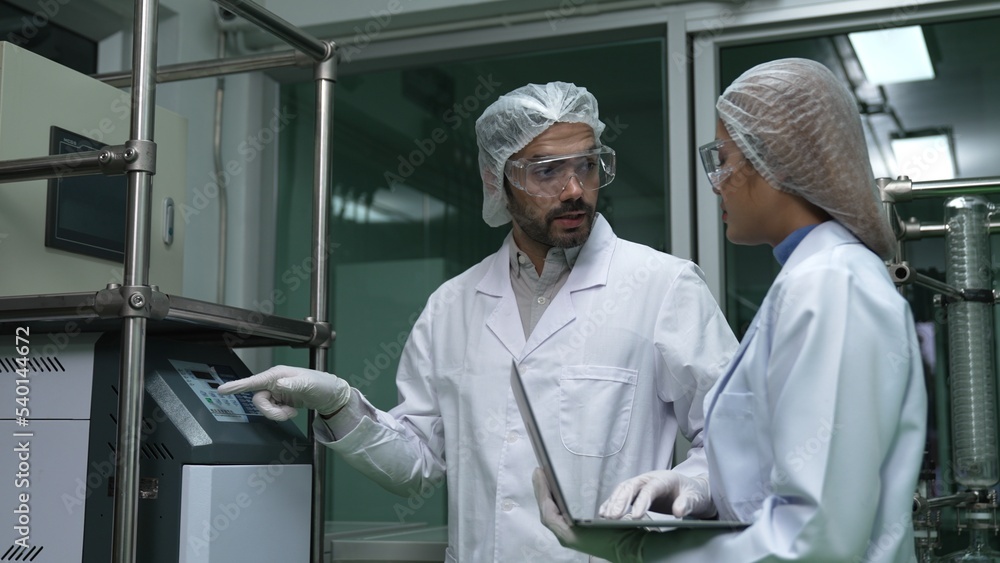 Poster two scientist in professional uniform working in laboratory for chemical and biomedical experiment