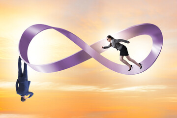 Business people running on the endless loop