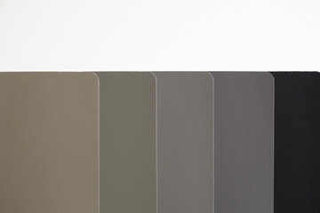 Color swatches in shades of gray. Generic color sample swatches in shades of grays, from light to dark. Drab color scheme. Interior design color pallet and inspiration.