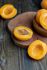 Orange-colored ripe apricot cut into pieces
