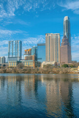 Fototapeta na wymiar Austin Texas city skyline reflected on the calm water of the Colorado River