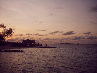 Obraz premium Sunset over the sea Maldivas.