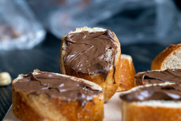 chocolate butter spread on a baguette, close up
