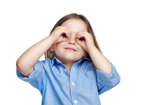 Little Girl Looking Through Binoculars Made Of Hands