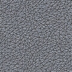 The brown leather is smooth and supple, stretched taut over the rectangular frame. The light shines off the surface in a uniform manner, showing no imperfections in the material.