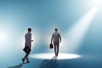Business people under the spotlight