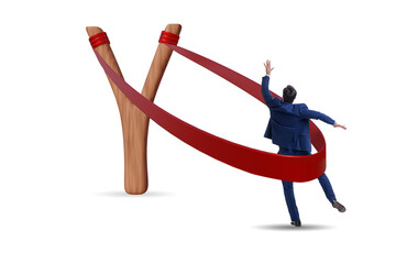 Businessman being launched from slingshot in career concept