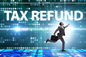 Businessman in tax refund concept