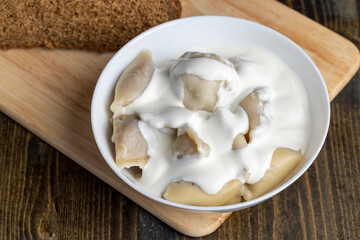 Cooked dumplings made of dough with meat inside