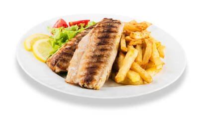 Fish and french fries on white plate