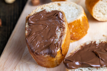 chocolate butter spread on a baguette, close up