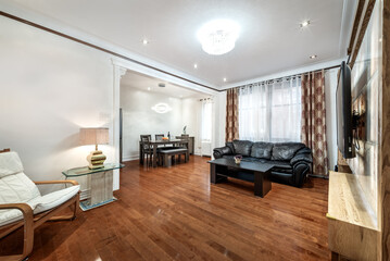 Luxury renovated furnished apartment in Montreal with finished basement, backyard, loundry, bedrooms, living room an kitchen