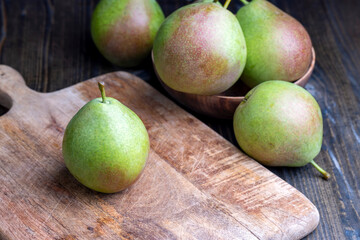 Whole ripe green pears, close up
