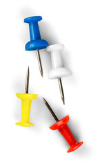 Group of colorful push pins on white background