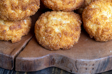 Delicious cookies with coconut on the table