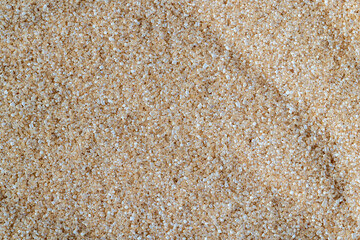 Brown crystalline sugar from cane