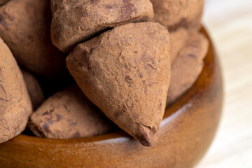 Chocolate truffle candy on the board