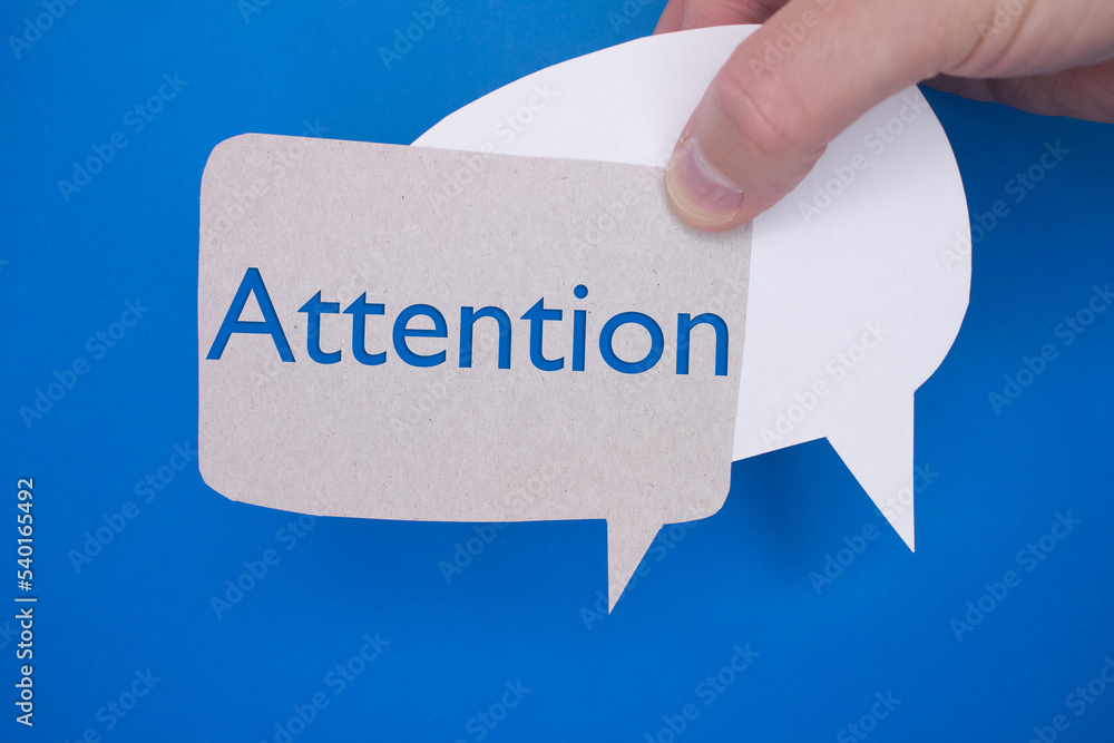 Poster speech bubble in front of colored background with attention text.