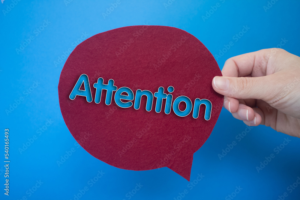 Poster speech bubble in front of colored background with attention text.