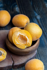 Orange-colored ripe apricot cut into pieces