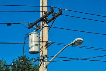 Street light and electrical pole with a transformer