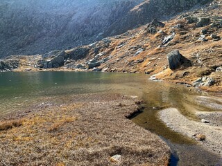 Early autumn on the alpine lakes Laghi della Valletta in the mountainous area of the St. Gotthard Pass (Gotthardpass), Airolo - Canton of Ticino (Tessin), Switzerland (Schweiz)
