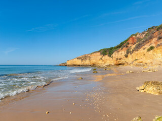 Maria Luisa beach with rock formation in Albufeira, Algarve, Portugal.