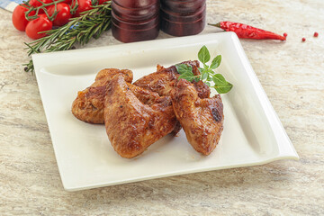 Roasted chicken wings with spicy sauce