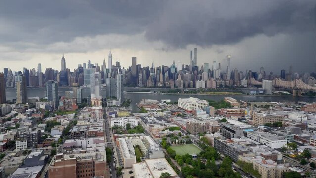 Time lapse of the New York city skyscrapers and the gradual gathering of grey clouds and rain