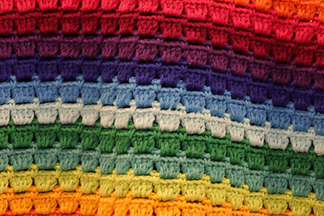 background of handmade fabric with rainbow colors