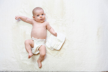 Diaper change newborn kid banner. Happy cute infant baby in nappy. Child care white background....