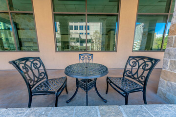 Plakat Coffee table with chairs and woven design at River Walk in San Antonio, Texas