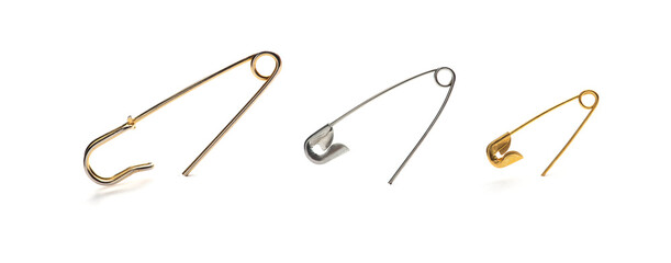 Set of safety pins isolated on white background. Gold and silver pins