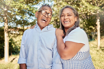 Obraz premium Love, happy and laugh with a senior couple in a garden outdoor for bonding or fun on vacation. Together, relationship and romantic with an elderly man and woman pensioner outside on a summer date