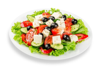 Close-up photo of fresh salad with vegetables in white plate