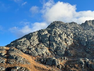 Rocks and stones in the autumn Swiss Alpine environment and in the St. Gotthard pass (Gotthardpass)...