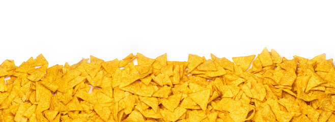 a heap of taco chips isolated on a white background fur panorama, banner, border