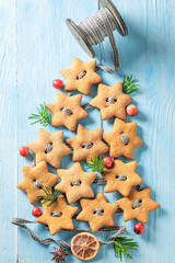 Aromatic gingerbread cookies chain for Christmas tree.