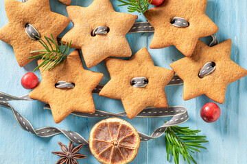 Homemade gingerbread cookies chain as unique decorations.
