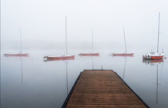 Sailboats on the Paprocany lake in autumn, Poland