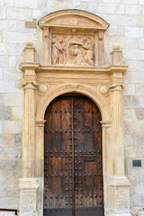 Door of the university de San Ildefonso in Alcala de Henares, Madrid, Spain