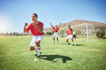 Man, soccer and team winner in celebration for sports victory, score or goal on the field in the...