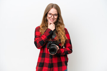Obraz premium Young photographer pretty woman isolated on white background with glasses and smiling