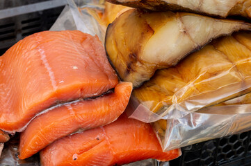 Smoked fish on the store counter.
